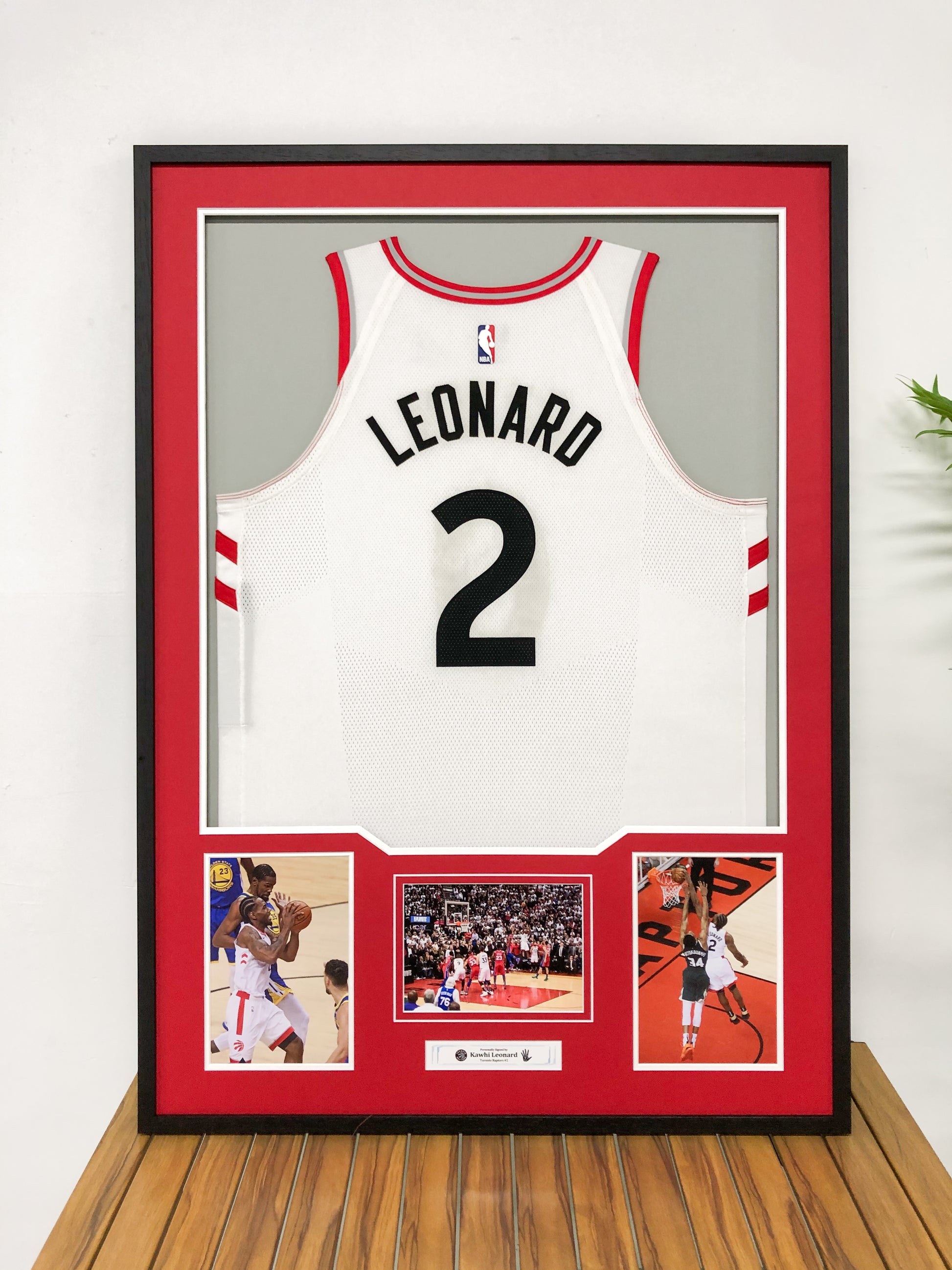 Toronto Raptors Kawhi Leonard Autographed Jersey with Standard Design Framed00002